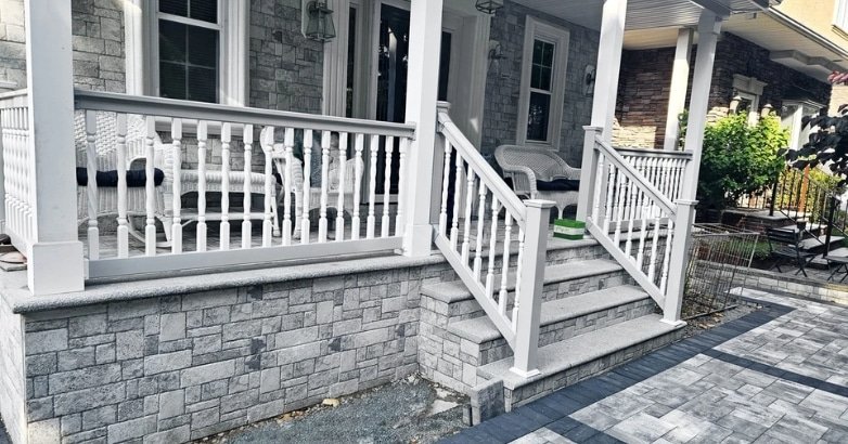 Front porch with durable aluminum railings and composite frames, ideal railing materials for coastal homes in the Tri-State Area.