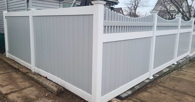 A white picket fence, representing a traditional fencing style, included in a checklist for fencing project planning.