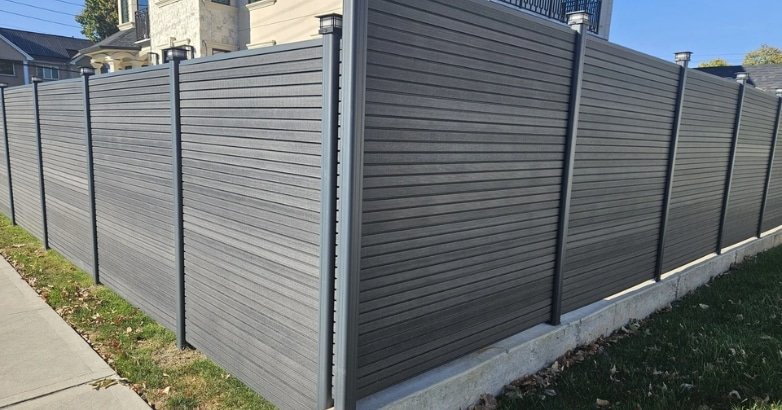 Questions to Ask Your Fencing Contractor Before Hiring Warranty & Maintenance A sturdy fence constructed from aluminum, illustrating a modern approach to fencing design and functionality.