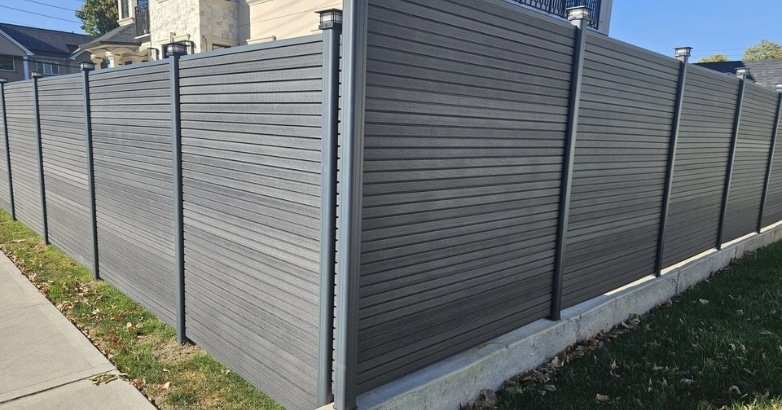 Space Saving Fencing Solutions Slim Composite Fence Panels A slim composite fence made of wood and steel, showcasing a modern space-saving design for outdoor areas.