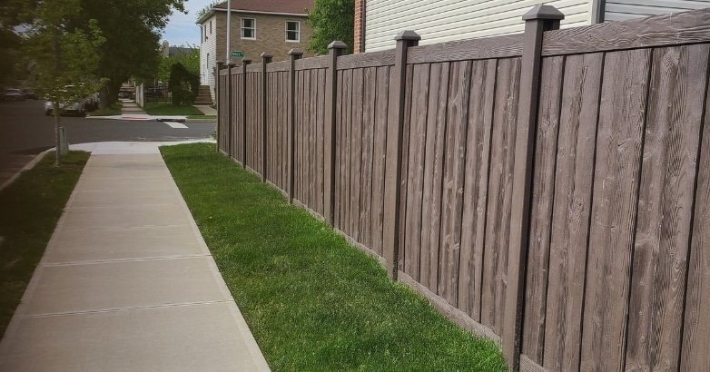Fencing Solutions for High Traffic Urban Areas What Defines A fence in a residential area, highlighting effective fencing solutions for busy urban environments.
